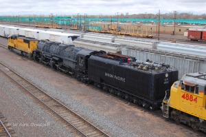 UP 4014 starts backing out of the "steam track" in Laramie, moving over to track 1 for display.