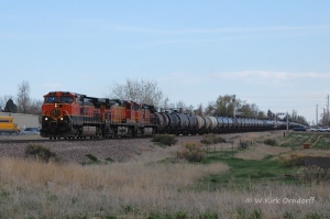 Sulfur empty with BNSF 965 approaches MP 63 as it departs Loveland.